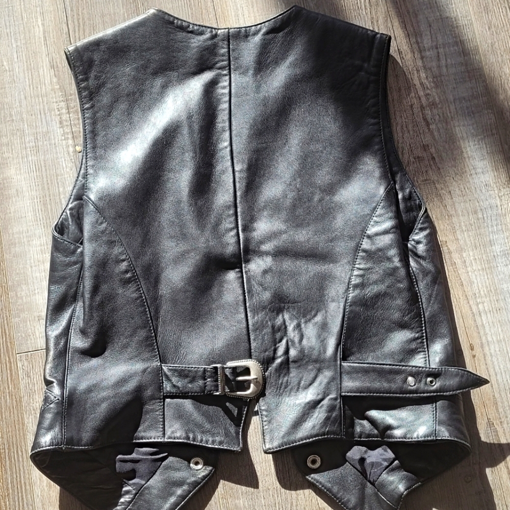 Black Leather Adult Vest. VERY lightly worn. Almost new.